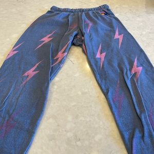 Blue and pink lightening bolt aviator nation sweatpants.